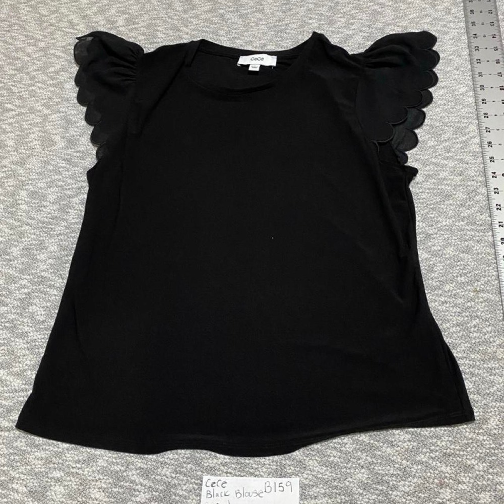 Black CeCe blouse with ruffled sleeves, size L. SKU-B159